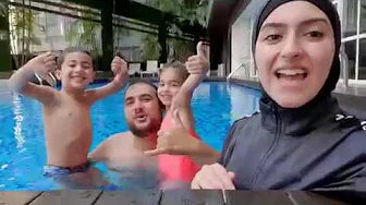 Family in the swimming pool