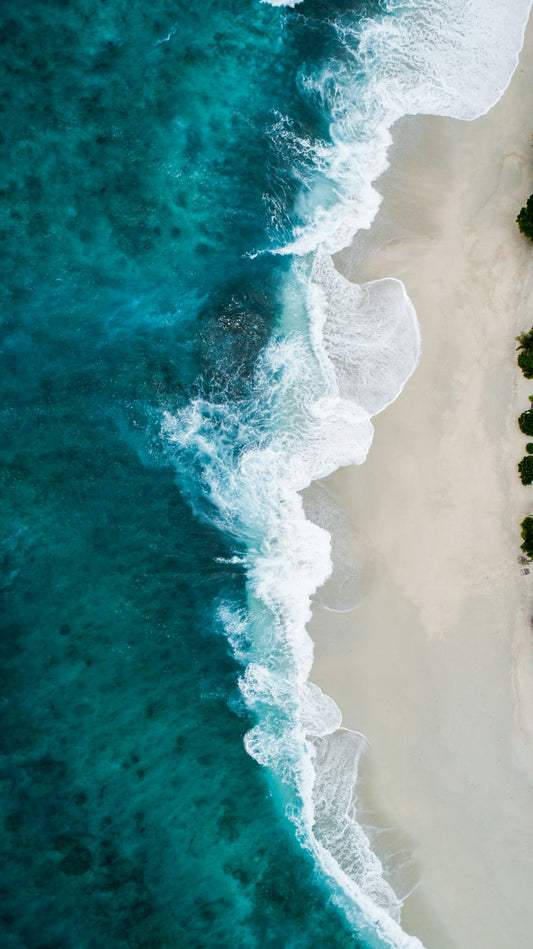 Calm ocean waves at sunrise representing nervous system regulation and finding peace from anxiety